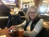 Kathy trying to celebrate on Thanksgiving at SeaTac
