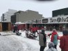 Mushers going up to the start line