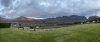 Panoramic view with the sun setting on the mountains