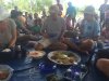 Brett being served at the community lunch