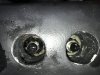 Two of the three rudder bolt holes.....nothing was used to protect the nuts from seawater