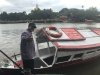 Our ferry across the River