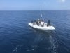 Kathy going on a dive dinghy while John rested his infected ear!!