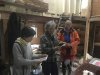 Sue giving Mr Saitosan and Keikosan prints from her art work