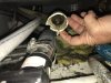 The hose going to the thru-hull is full of calcium carbonate pieces we loosened from the acid wash two weeks ago