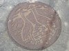 Painted manhole covers
