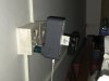 Converter plug into a surge protector into a converter plug inot a camer battery charger with a USB phone charge cord beneath.....the joys of traveling!!!!