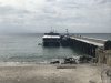 Our dinghy tied up to the ferry at the south pier on Corregidor