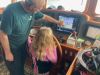 Papa YB showing Roxie where we are on the chart.....she was more content to turn the wheel:)))
