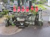 More statues with hats and scarfs meaning a child has died