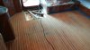 Mr Nu and crew revarnishing the salon, galley, pilot house and stairs