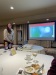 Jocelyn, our Expedition Leader, giving a slideshow presentation at the Welcome dinner