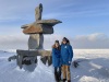 John and Kathy in our artic gear in front of Churchill Inukshuk, a cleverly balanced, historic rock formation