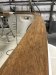 Sanded caprail to bare teak
