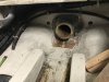 Shaft tube in engine room....the bottom 2 bolts had been partially epoxied from the factory causing us to cut out some of the bilge area