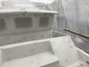 The black spray is a sanding guide coat to help the sanders know what has not been sanded
