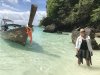 Kathy next to our long tail boat