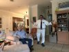 My roommate Bob at his house holding court with Rocky looking amused!!