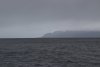 That is the infamous Cape Spencer at the northwest point of Cross Sound; note the weather has turned to typical Alaska!!