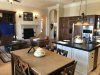 The main family room and kitchen. We did buy that very comfortable big chair and the big TV was part of the deal!!