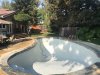 Kathy watching the pool stating to fill