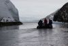 Heading back to the ship through a small narrows with an ice cliff overhang....must go faster:)))